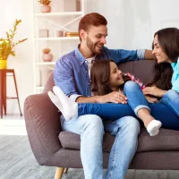 Family of three on the couch