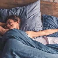 woman laying in bed