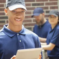 Young technician smiling