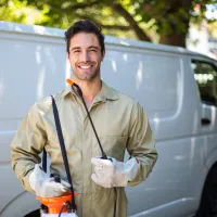 Technician smiling outside