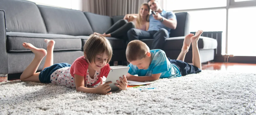 kids playing on living room rug