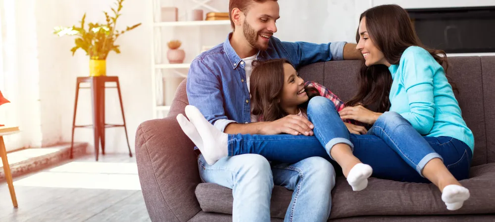 Family of three on the couch