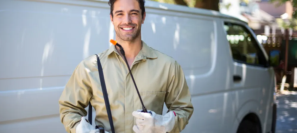 Technician smiling outside