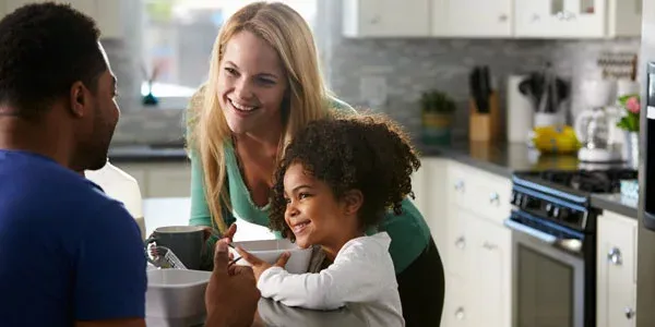 Family and daughter in kitchen